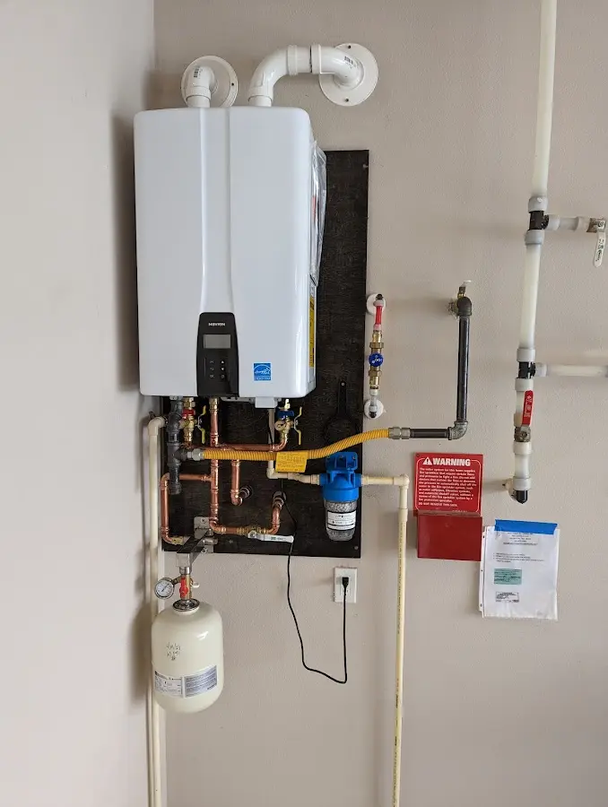 Professional plumber installing copper piping in a Crystal River home